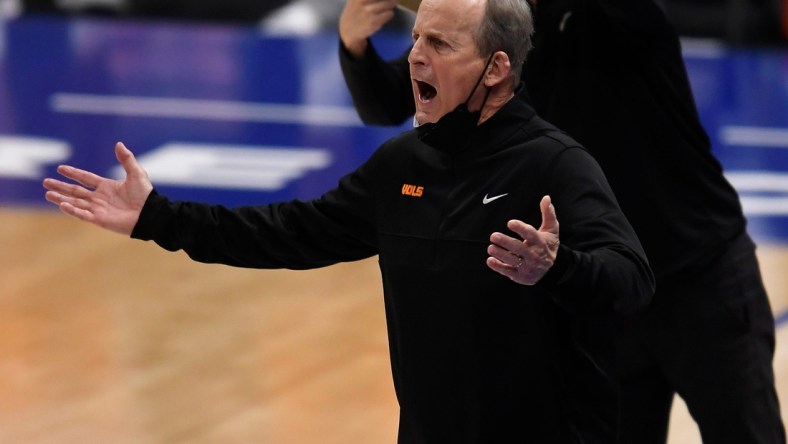 Tennessee head coach Rick Barnes argues a referees call during the second half of the SEC Men's Basketball Tournament semifinal game against Alabama at  Bridgestone Arena Saturday, March 13, 2021 in Nashville, Tenn.

Nas Sec Tenn Ala 026