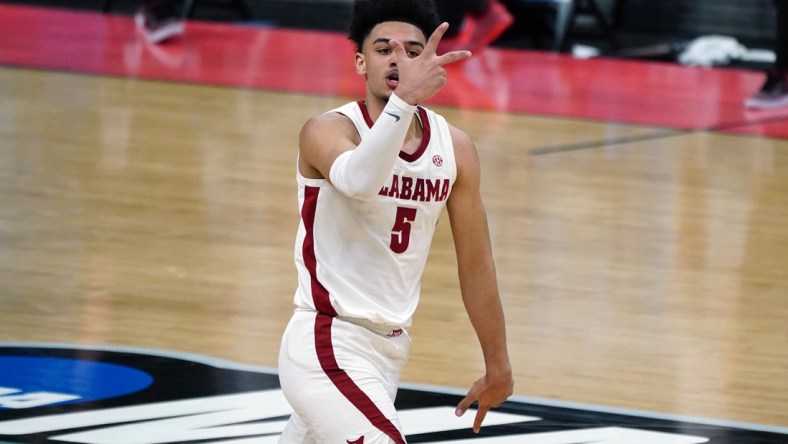 Mar 22, 2021; Indianapolis, Indiana, USA; Alabama Crimson Tide guard Jaden Shackelford (5) reacts in the second half against the Maryland Terrapins  in the second round of the 2021 NCAA Tournament at Bankers Life Fieldhouse. Mandatory Credit: Kirby Lee-USA TODAY Sports