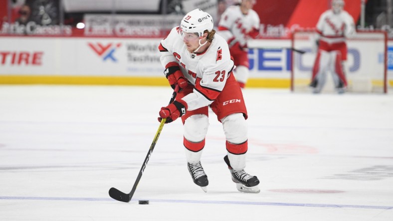 Mar 16, 2021; Detroit, Michigan, USA; Carolina Hurricanes left wing Brock McGinn (23) during the game against the Detroit Red Wings at Little Caesars Arena. Mandatory Credit: Tim Fuller-USA TODAY Sports