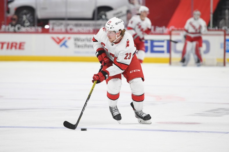 Mar 16, 2021; Detroit, Michigan, USA; Carolina Hurricanes left wing Brock McGinn (23) during the game against the Detroit Red Wings at Little Caesars Arena. Mandatory Credit: Tim Fuller-USA TODAY Sports