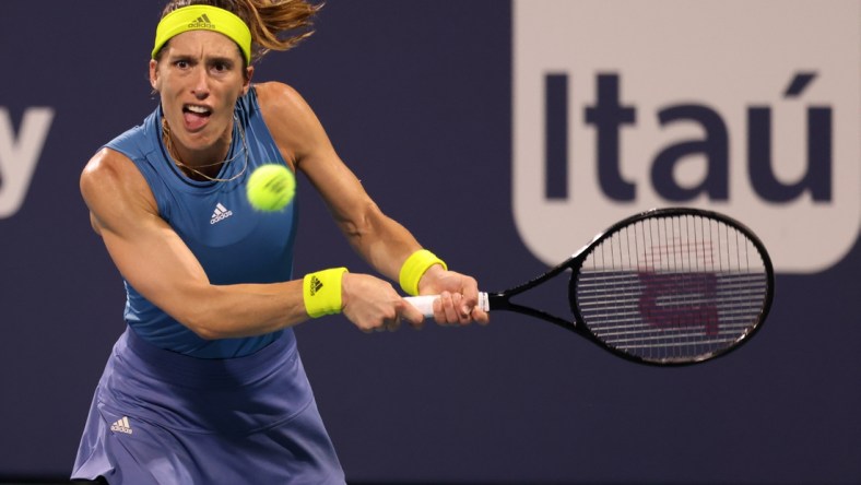 Mar 26, 2021; Miami, Florida, USA; Andrea Petkovic of Germany hits a backhand against Sofia Kenin of the United States (not pictured) in the second round in the Miami Open at Hard Rock Stadium. Mandatory Credit: Geoff Burke-USA TODAY Sports