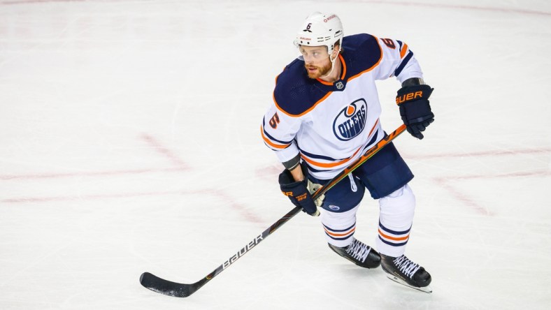 Mar 15, 2021; Calgary, Alberta, CAN; Edmonton Oilers defenseman Adam Larsson (6) skates against the Calgary Flames during the second period at Scotiabank Saddledome. Mandatory Credit: Sergei Belski-USA TODAY Sports