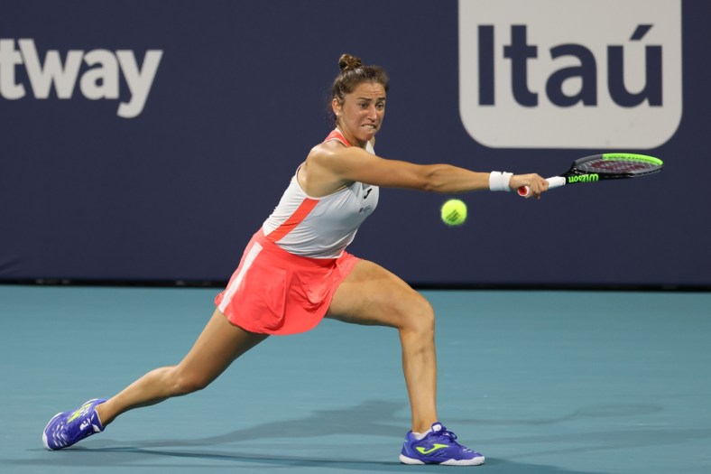 Mar 31, 2021; Miami, Florida, USA; Sara Sorribes Tormo of Spain reaches for a backhand against Bianca Andreescu of Canada (not pictured) in a women's singles quarterfinal in the Miami Open at Hard Rock Stadium. Mandatory Credit: Geoff Burke-USA TODAY Sports
