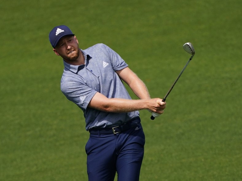 Apr 8, 2021; Augusta, Georgia, USA; Daniel Berger chips onto the 2nd green during the first round of The Masters golf tournament. Mandatory Credit: Michael Madrid-USA TODAY Sports