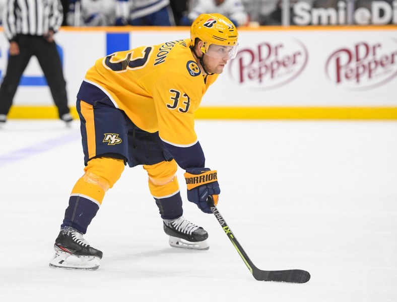 Apr 13, 2021; Nashville, Tennessee, USA;  Nashville Predators right wing Viktor Arvidsson (33) awaits the face off against the Tampa Bay Lightning during the first period at Bridgestone Arena. Mandatory Credit: Steve Roberts-USA TODAY Sports