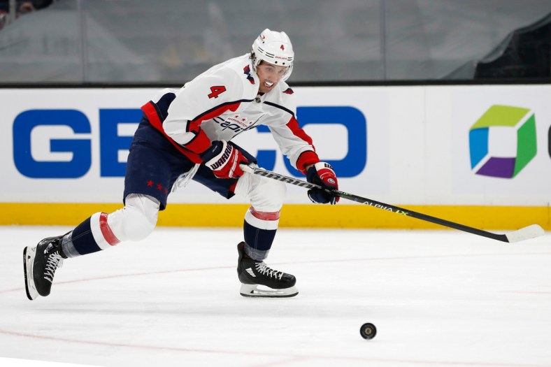 Apr 18, 2021; Boston, Massachusetts, USA; Washington Capitals defenseman Brenden Dillon (4) during the first period against the Boston Bruins at TD Garden. Mandatory Credit: Winslow Townson-USA TODAY Sports
