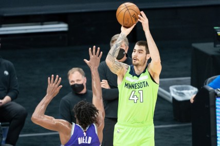 April 20, 2021; Sacramento, California, USA; Minnesota Timberwolves forward Juancho Hernangomez (41) shoots the basketball against Sacramento Kings guard Buddy Hield (24) during the first quarter at Golden 1 Center. Mandatory Credit: Kyle Terada-USA TODAY Sports