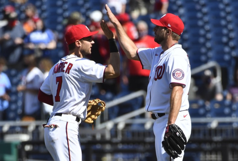 May 2, 2021; Washington, District of Columbia, USA; Washington Nationals starting pitcher Max Scherzer (31) is congratulated by shortstop Trea Turner (7) after the game against the Miami Marlins at Nationals Park. Mandatory Credit: Brad Mills-USA TODAY Sports