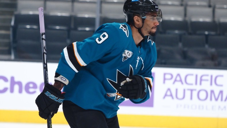 May 3, 2021; San Jose, California, USA; San Jose Sharks left wing Evander Kane (9) after scoring a goal against the Colorado Avalanche during the first period at SAP Center at San Jose. Mandatory Credit: Kelley L Cox-USA TODAY Sports