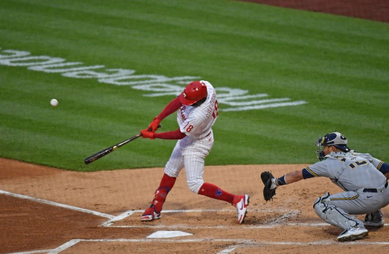 May 5, 2021; Philadelphia, Pennsylvania, USA; Philadelphia Phillies shortstop Didi Gregorius (18) hits a grand slam during the first inning against the Milwaukee Brewers at Citizens Bank Park. Mandatory Credit: Eric Hartline-USA TODAY Sports