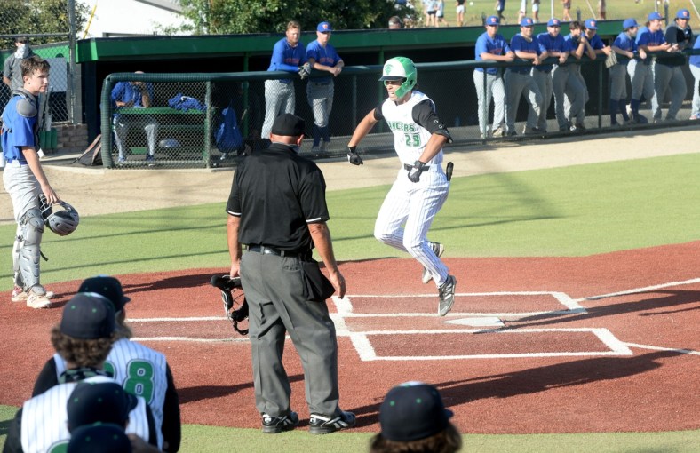 Thousand Oaks High's Max Muncy celebrates after touching home plate after hitting a game-tying home run in the bottom of the sixth inning against Westlake in a Marmonte League game on Wednesday, May 5, 2021. The Lancers won 10-8 to improve to 17-0 overall and 9-0 in league.

Thousand Oaks Westlake Baseball 3