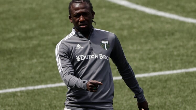 May 9, 2021; Portland, Oregon, USA; Portland Timbers midfielder Diego Chara (21) warms up before a match  against the Seattle Sounders at Providence Park. Mandatory Credit: Soobum Im-USA TODAY Sports