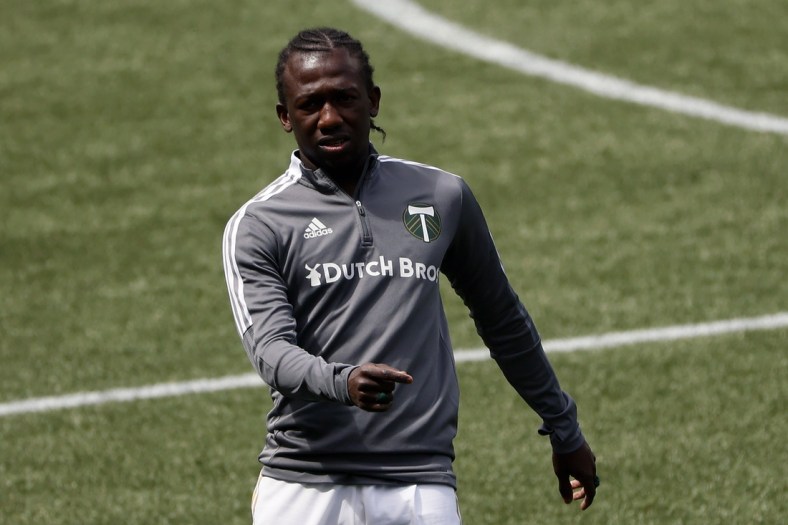 May 9, 2021; Portland, Oregon, USA; Portland Timbers midfielder Diego Chara (21) warms up before a match  against the Seattle Sounders at Providence Park. Mandatory Credit: Soobum Im-USA TODAY Sports
