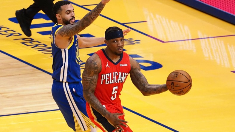 May 14, 2021; San Francisco, California, USA; New Orleans Pelicans guard Eric Bledsoe (5) looks to pass the ball against Golden State Warriors guard Mychal Mulder (15) during the second quarter at Chase Center. Mandatory Credit: Kelley L Cox-USA TODAY Sports