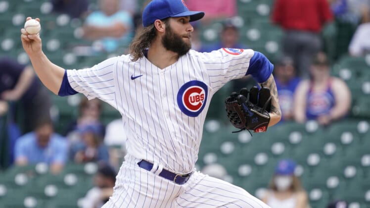 May 20, 2021; Chicago, Illinois, USA; Chicago Cubs starting pitcher Trevor Williams (32) throws the ball against the Washington Nationals during the first inning at Wrigley Field. Mandatory Credit: David Banks-USA TODAY Sports