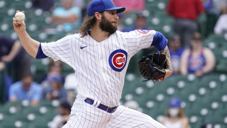 May 20, 2021; Chicago, Illinois, USA; Chicago Cubs starting pitcher Trevor Williams (32) throws the ball against the Washington Nationals during the first inning at Wrigley Field. Mandatory Credit: David Banks-USA TODAY Sports