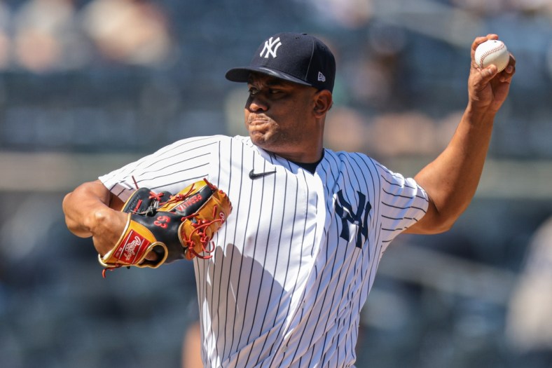 May 23, 2021; Bronx, New York, USA; New York Yankees relief pitcher Wandy Peralta (58) delivers a pitch during the sixth inning against the Chicago White Sox at Yankee Stadium. Mandatory Credit: Vincent Carchietta-USA TODAY Sports
