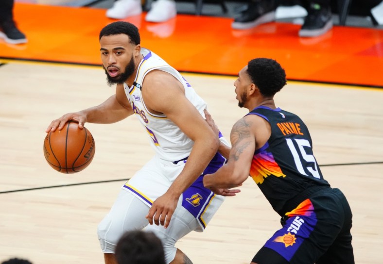 May 23, 2021; Phoenix, Arizona, USA; Los Angeles Lakers guard Talen Horton-Tucker (5) against Phoenix Suns guard Cameron Payne (15) during game one in the first round of the 2021 NBA Playoffs. at Phoenix Suns Arena. Mandatory Credit: Mark J. Rebilas-USA TODAY Sports