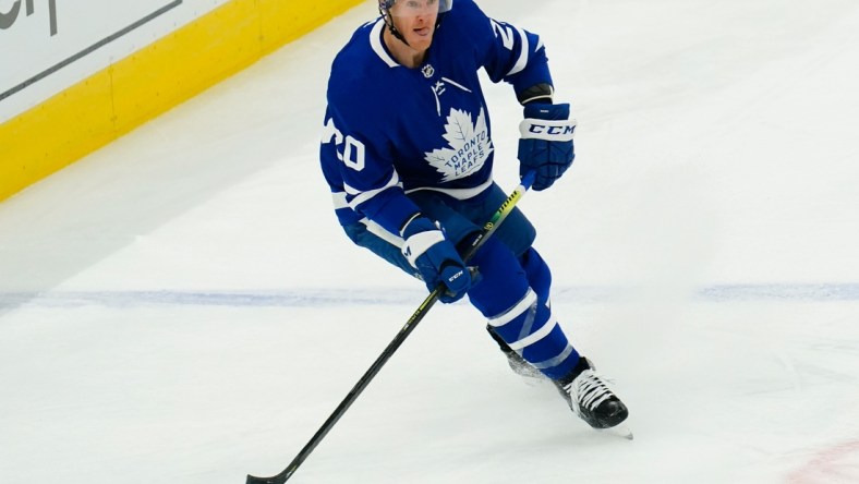 May 20, 2021; Toronto, Ontario, CAN; Toronto Maple Leafs forward Riley Nash (20) looks to pass the puck against the Montreal Canadiens during the first period of game one of the first round of the 2021 Stanley Cup Playoffs at Scotiabank Arena. Mandatory Credit: John E. Sokolowski-USA TODAY Sports