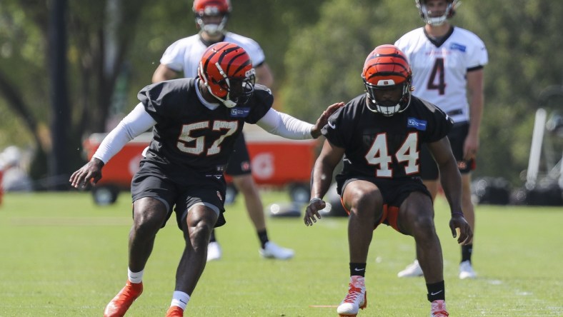 May 25, 2021; Cincinnati, Ohio, USA; Cincinnati Bengals linebacker Germaine Pratt (57) runs a drill with linebacker Darius Hodge (44) during practice at Paul Brown Stadium. Mandatory Credit: Katie Stratman-USA TODAY Sports