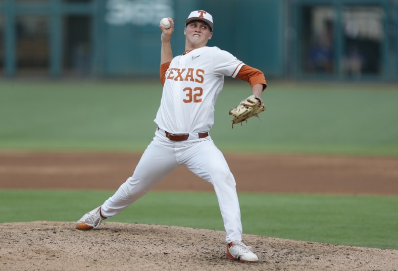 May 26, 2021; Oklahoma City, Oklahoma, USA; Texas pitcher Ty Madden (32) delivers a pitch to West Virginia  during the Big 12 Conference Baseball Tournament at Chickasaw Bricktown Ballpark. Mandatory Credit: Alonzo Adams-USA TODAY Sports