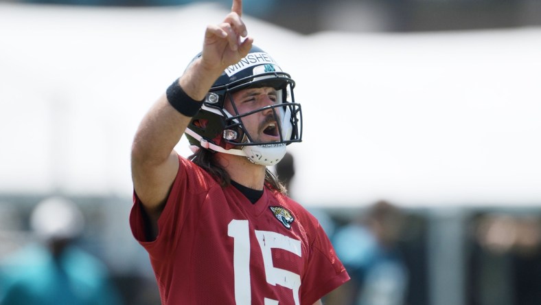 Jaguars (15) QB Gardner Minshew gives instructions during drills at Thursday's OTA session. The Jacksonville Jaguars held their Thursday session of organized team activity at the practice fields outside TIAA Bank Field, May 27, 2021.Jki 052721 Jagsotas 19