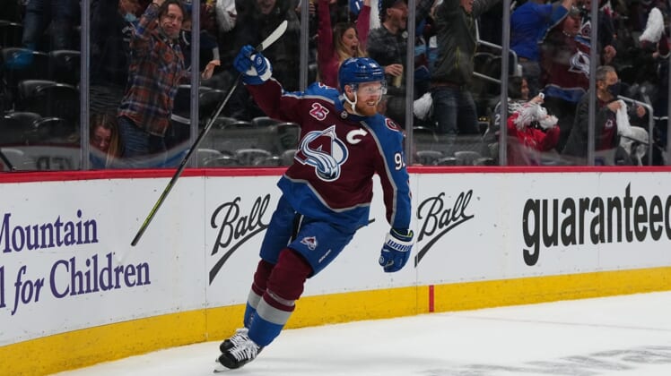May 30, 2021; Denver, Colorado, USA; Colorado Avalanche left wing Gabriel Landeskog (92) celebrates his goal in the first period against the Vegas Golden Knights of game one in the second round of the 2021 Stanley Cup Playoffs at Ball Arena. Mandatory Credit: Ron Chenoy-USA TODAY Sports