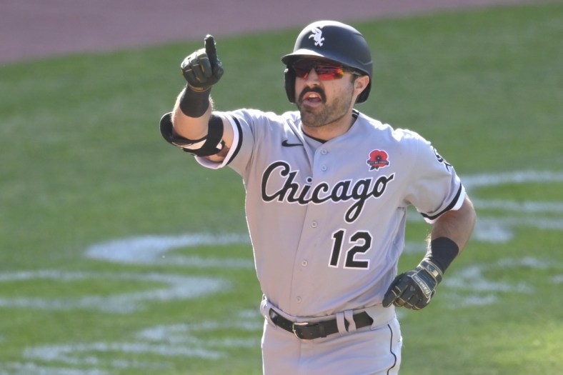 May 31, 2021; Cleveland, Ohio, USA; Chicago White Sox right fielder Adam Eaton (12) celebrates his two-run home run in the eighth inning against the Cleveland Indians at Progressive Field. Mandatory Credit: David Richard-USA TODAY Sports