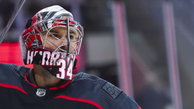 Jun 1, 2021; Raleigh, North Carolina, USA; Carolina Hurricanes goaltender Petr Mrazek (34) looks on before the game against the Tampa Bay Lightning in game two of the second round of the 2021 Stanley Cup Playoffs at PNC Arena. Mandatory Credit: James Guillory-USA TODAY Sports