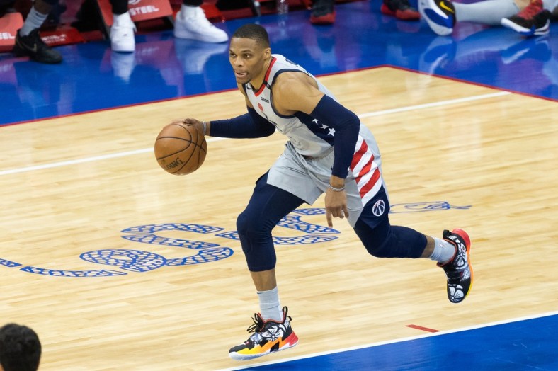 Jun 2, 2021; Philadelphia, Pennsylvania, USA; Washington Wizards guard Russell Westbrook (4) dribbles the ball up court against the Philadelphia 76ers during the fourth quarter in game five of the first round of the 2021 NBA Playoffs at Wells Fargo Center. Mandatory Credit: Bill Streicher-USA TODAY Sports