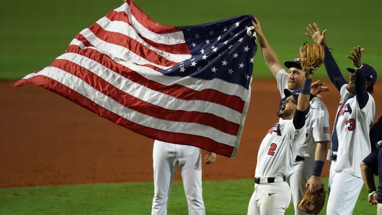 USA players celebrate after defeating Venezuela in the Super Round of the WBSC Baseball Americas Qualifier series game at Clover Park and qualifying for the Olympic Games in Tokyo Japan. Mandatory Credit: Jasen Vinlove-USA TODAY Sports