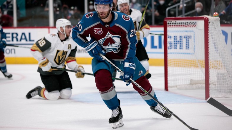 Jun 8, 2021; Denver, Colorado, USA; Colorado Avalanche left wing Brandon Saad (20) controls the puck in the first period against the Vegas Golden Knights in game five of the second round of the 2021 Stanley Cup Playoffs at Ball Arena. Mandatory Credit: Isaiah J. Downing-USA TODAY Sports