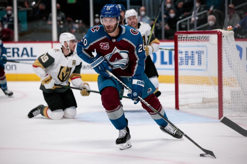 Jun 8, 2021; Denver, Colorado, USA; Colorado Avalanche left wing Brandon Saad (20) controls the puck in the first period against the Vegas Golden Knights in game five of the second round of the 2021 Stanley Cup Playoffs at Ball Arena. Mandatory Credit: Isaiah J. Downing-USA TODAY Sports