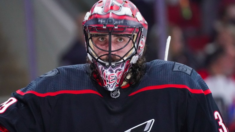 Jun 1, 2021; Raleigh, North Carolina, USA; Carolina Hurricanes goaltender Alex Nedeljkovic (39) looks on against the Tampa Bay Lightning in game two of the second round of the 2021 Stanley Cup Playoffs at PNC Arena. Mandatory Credit: James Guillory-USA TODAY Sports