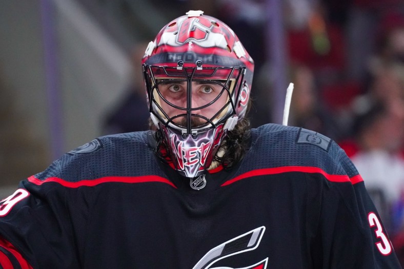 Jun 1, 2021; Raleigh, North Carolina, USA; Carolina Hurricanes goaltender Alex Nedeljkovic (39) looks on against the Tampa Bay Lightning in game two of the second round of the 2021 Stanley Cup Playoffs at PNC Arena. Mandatory Credit: James Guillory-USA TODAY Sports