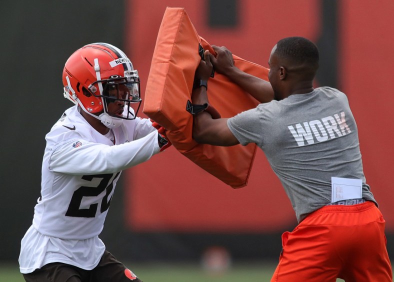 Cleveland Browns cornerback Greg Newsome II participates in drills during an NFL football practice at the team's training facility, Tuesday, June 15, 2021, in Berea, Ohio. [Jeff Lange / Akron Beacon Journal]

Browns 4