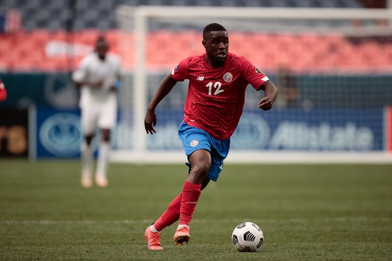 Jun 6, 2021; Denver, Colorado, USA; Costa Rica forward Joel Campbell (12) controls the ball in the first half against Honduras during the 2021 CONCACAF Nations League Finals soccer series third place match at Empower Field at Mile High. Mandatory Credit: Isaiah J. Downing-USA TODAY Sports