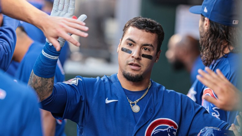 Jun 17, 2021; New York City, New York, USA;  Chicago Cubs shortstop Javier Baez (9) celebrates with teammates after hitting a two-run home run against the New York Mets during the first inning at Citi Field. Mandatory Credit: Vincent Carchietta-USA TODAY Sports