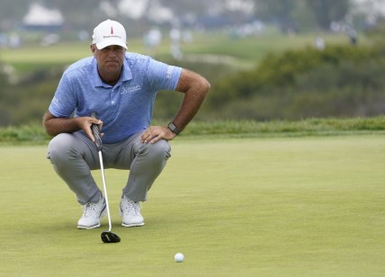 Jun 18, 2021; San Diego, California, USA; Stewart Cink lines up a putt on the 13th green during the second round of the U.S. Open golf tournament at Torrey Pines Golf Course. Mandatory Credit: Michael Madrid-USA TODAY Sports