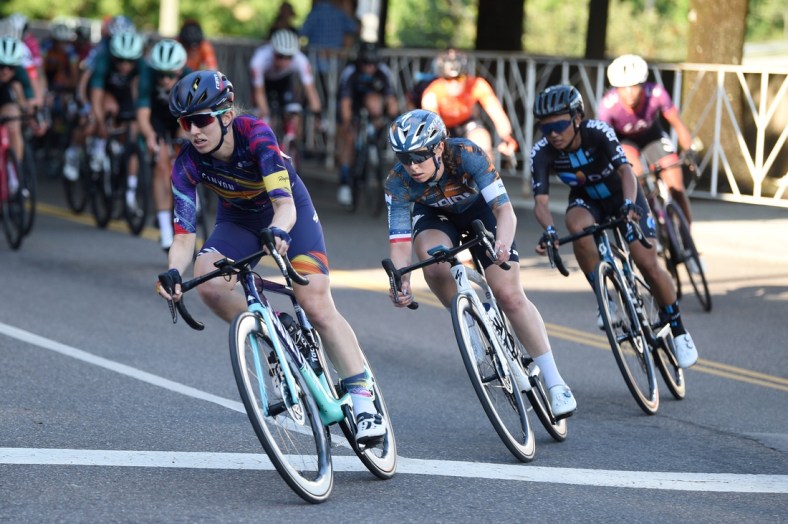 Cyclists round a corner during the women's 2021 USA Cycling Pro Criterium National Championships in downtown Knoxville Friday, June 18, 2021.

Usacycling0618 0325