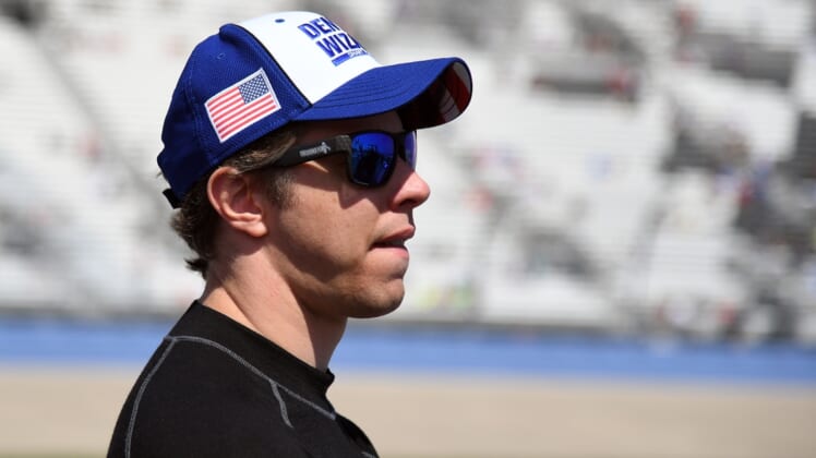 Jun 20, 2021; Nashville, Tennessee, USA; NASCAR Cup Series driver Brad Keselowski (2) waits beside his car before qualifying for the Ally 400 at Nashville Superspeedway. Mandatory Credit: Christopher Hanewinckel-USA TODAY Sports