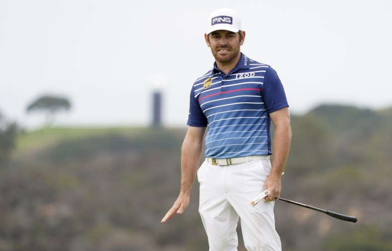 Jun 20, 2021; San Diego, California, USA; Louis Oosthuizen reacts to his putt on the 13th green during the final round of the U.S. Open golf tournament at Torrey Pines Golf Course. Mandatory Credit: Michael Madrid-USA TODAY Sports