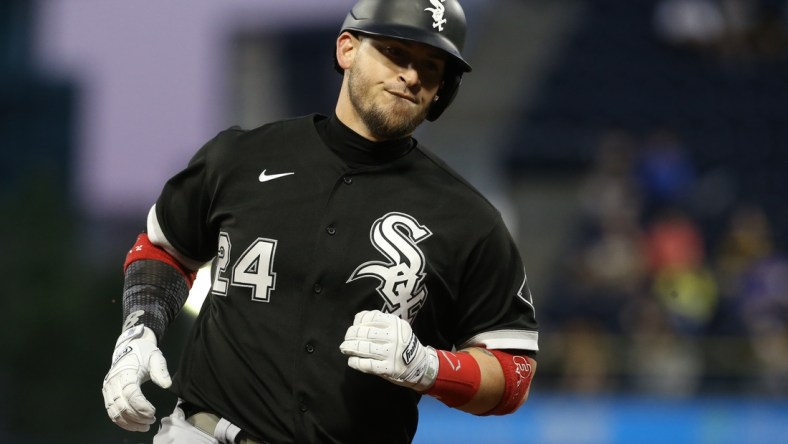 Jun 22, 2021; Pittsburgh, Pennsylvania, USA;  Chicago White Sox pinch hitter Yasmani Grandal (24) circles the bases after hitting a three run home run against the Pittsburgh Pirates during the seventh inning at PNC Park. Mandatory Credit: Charles LeClaire-USA TODAY Sports