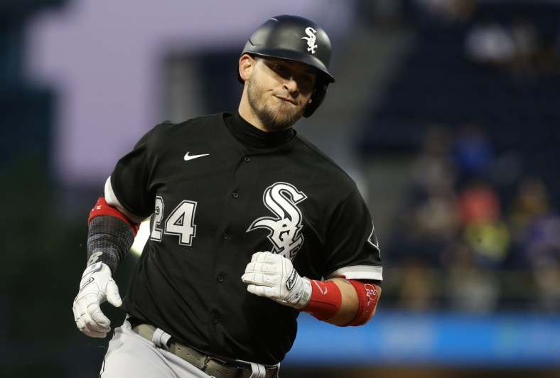 Jun 22, 2021; Pittsburgh, Pennsylvania, USA;  Chicago White Sox pinch hitter Yasmani Grandal (24) circles the bases after hitting a three run home run against the Pittsburgh Pirates during the seventh inning at PNC Park. Mandatory Credit: Charles LeClaire-USA TODAY Sports