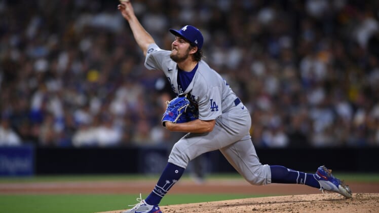 Jun 23, 2021; San Diego, California, USA; Los Angeles Dodgers starting pitcher Trevor Bauer (27) throws a pitch against the San Diego Padres during the third inning at Petco Park. Mandatory Credit: Orlando Ramirez-USA TODAY Sports