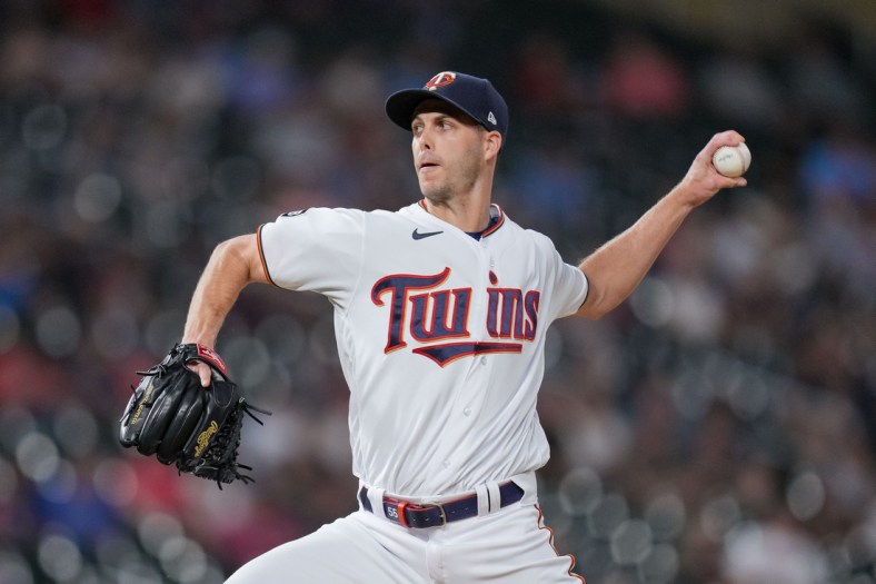 Jun 24, 2021; Minneapolis, Minnesota, USA; Minnesota Twins relief pitcher Taylor Rogers (55) throws a pitch against the Cleveland Indians during the eighth inning at Target Field. Mandatory Credit: Brad Rempel-USA TODAY Sports