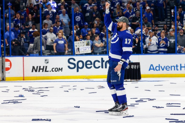 Jun 25, 2021; Tampa, Florida, USA; Tampa Bay Lightning left wing Alex Killorn (17) greats the fans after beating the New York Islanders 1-0 in game seven of the Stanley Cup Semifinals at Amalie Arena. Mandatory Credit: Nathan Ray Seebeck-USA TODAY Sports