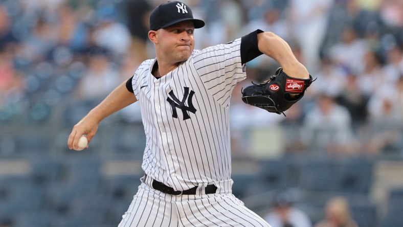 Jun 28, 2021; Bronx, New York, USA;  New York Yankees starting pitcher Michael King (73) delivers a pitch during the first inning at Yankee Stadium. Mandatory Credit: Vincent Carchietta-USA TODAY Sports