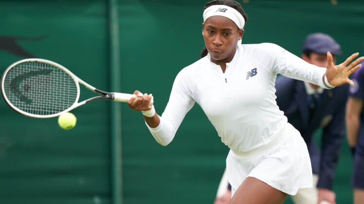 Jun 29, 2021; London, United Kingdom;  Coco Gauff (USA) in action Francesca Jones (GBR) in first round ladies singles on No. 2 court at All England Lawn Tennis and Croquet Club. Mandatory Credit: Peter van den Berg-USA TODAY Sports