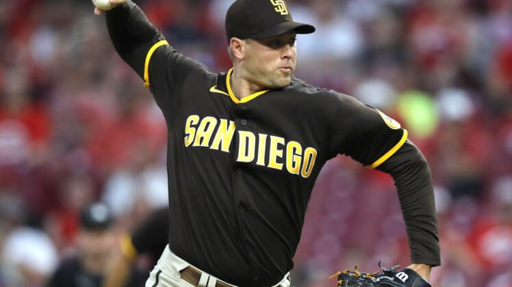 Jun 29, 2021; Cincinnati, Ohio, USA; San Diego Padres relief pitcher Craig Stammen (34) throws a pitch against the Cincinnati Reds during the first inning at Great American Ball Park. Mandatory Credit: David Kohl-USA TODAY Sports